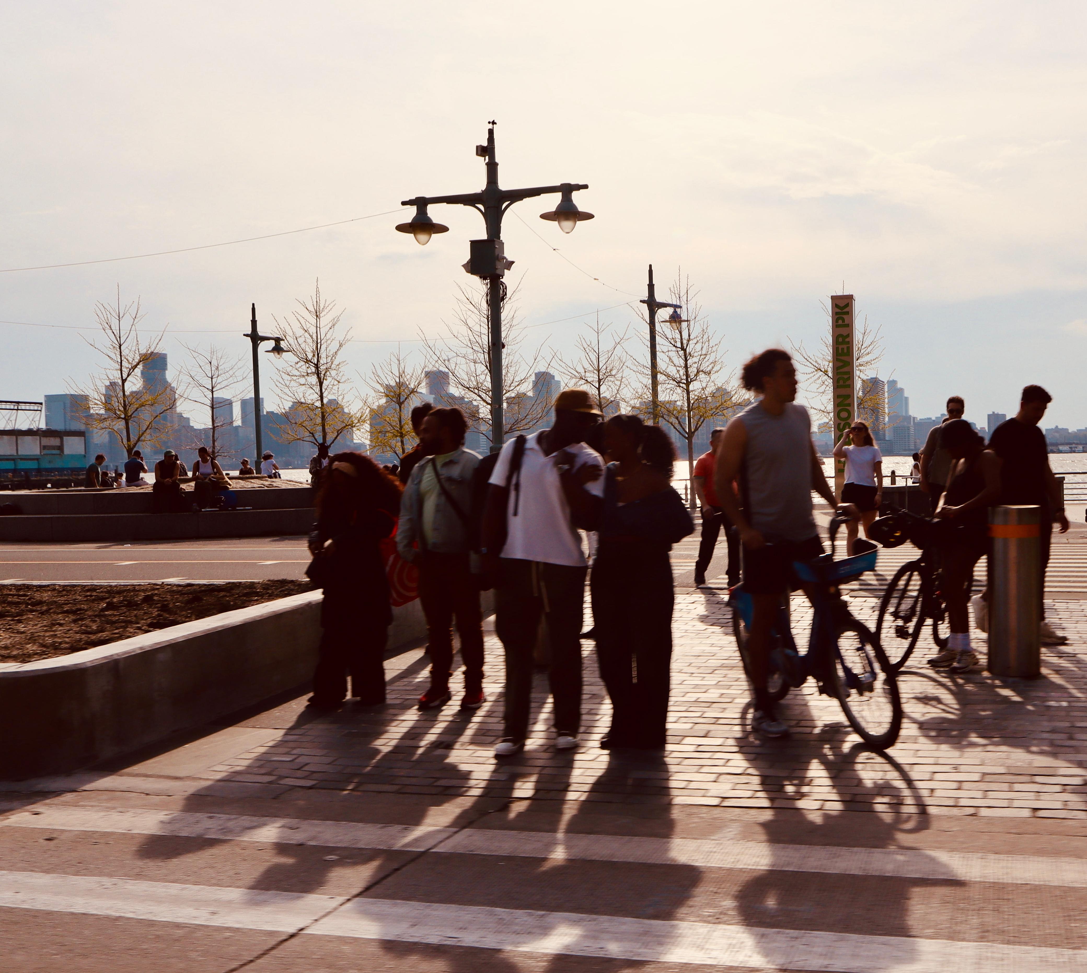People waiting at the traffic signal